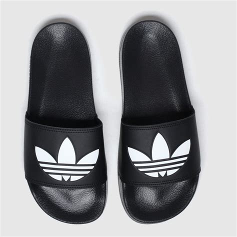 adidas schwarz weiß patch turnschuhe|Adidas sandalen kaufen.